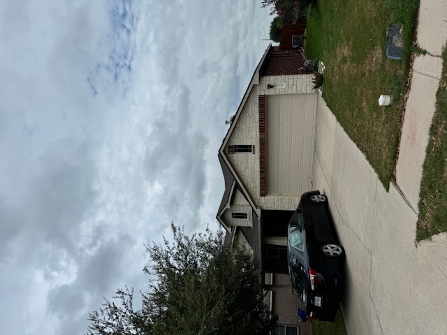 Completed shingle roof replacement on Austin home