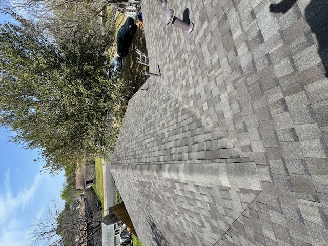 CertainTeed underlayment being installed by crew during roof replacement